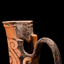 A Red Figure Oinochoe with a Woman's Face, Greek, Hellenistic Period, circa 330 B.C.E. -63 B.C.E.