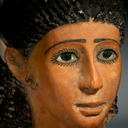 A Fine Egyptian Gypsum Mask of a Young Woman