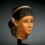 A Fine Egyptian Gypsum Mask of a Young Woman