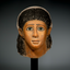 A Fine Egyptian Gypsum Mask of a Young Woman