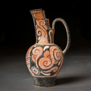 A Red Figure Oinochoe with a Woman's Face, Greek, Hellenistic Period, circa 330 B.C.E. -63 B.C.E.